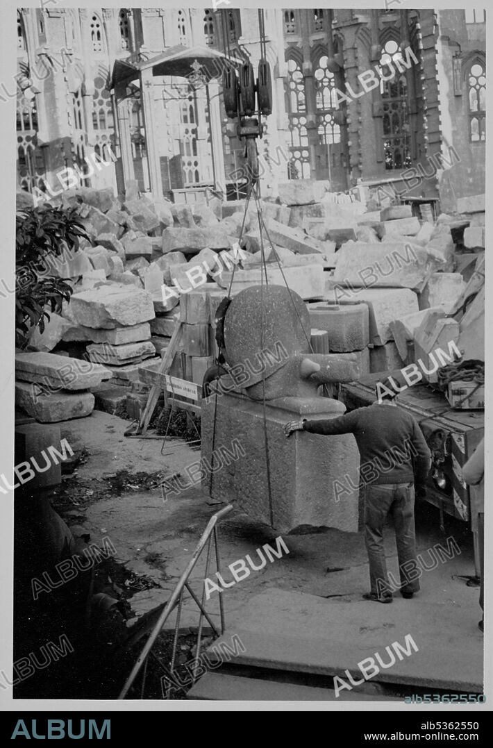 LLORENÇ MATAMALA I PIÑOL. Sagrada Familia (under restauration): installation of gargoyles in the form of land and sea snails on the side stairs at both ends of the apse, c. 1977.