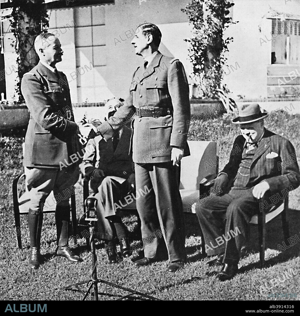 'Henri Giraud and de Gaulle during the Casablanca Conference, January, 1943, (1945). Churchill and Roosevelt are in the background. From Winston Churchill: His Life in Pictures, by Ben Tucker. [Sagall Press, Ltd., London, 1945].