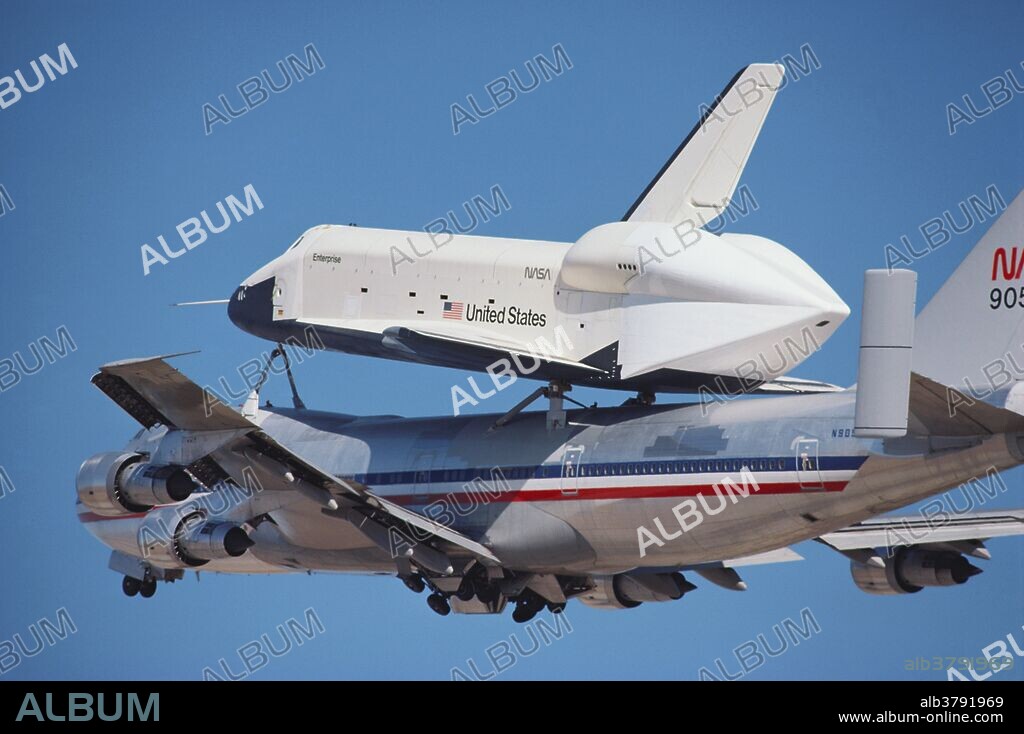 The Space Shuttle Enterprise was the first Space Shuttle orbiter, and was designed solely for test flights within the atmosphere.  It had no engines or heat shield.  Here, it is connected to a Shuttle Carrier Aircraft, a modified 747, during the shuttle's 1st manned flight over Edwards Airforce Base; 1977.