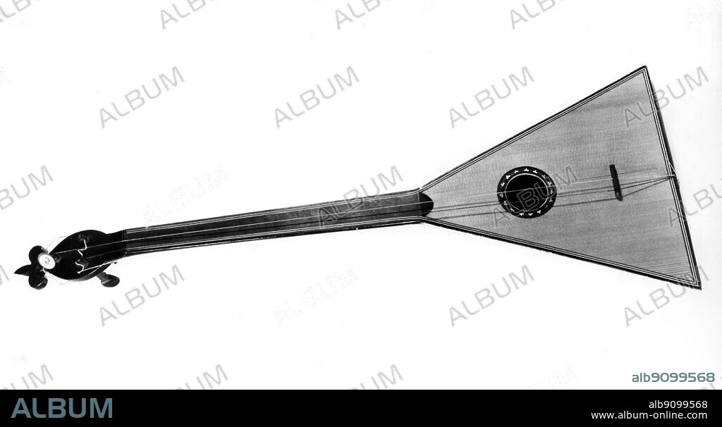 Balalaika : stringed instrument of Russian origin , with a characteristic triangular body and 3 strings.