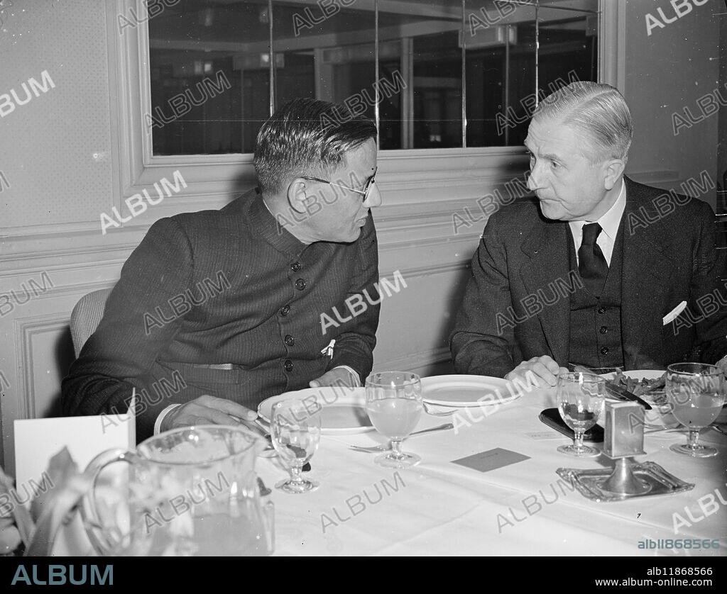 INDIAN EDITORS ENTERTAINED. TO LUNCHEON . The Indian and Eastern Newspaper Society , entertained the Delegation of Indian Editors to Luncheon at the Savoy Hotel , London . Editors and executives of most of the London newspapers and weeklies , as well as a large representation of Trade and commerce , were present . PICTURES SHOWS :- Mr . D . GUPTA , Editor of ' Tej ' (left) , pictured with Lord CATTO , Governor of the Bank of England , at the Savoy Luncheon . June 10 1948 .
