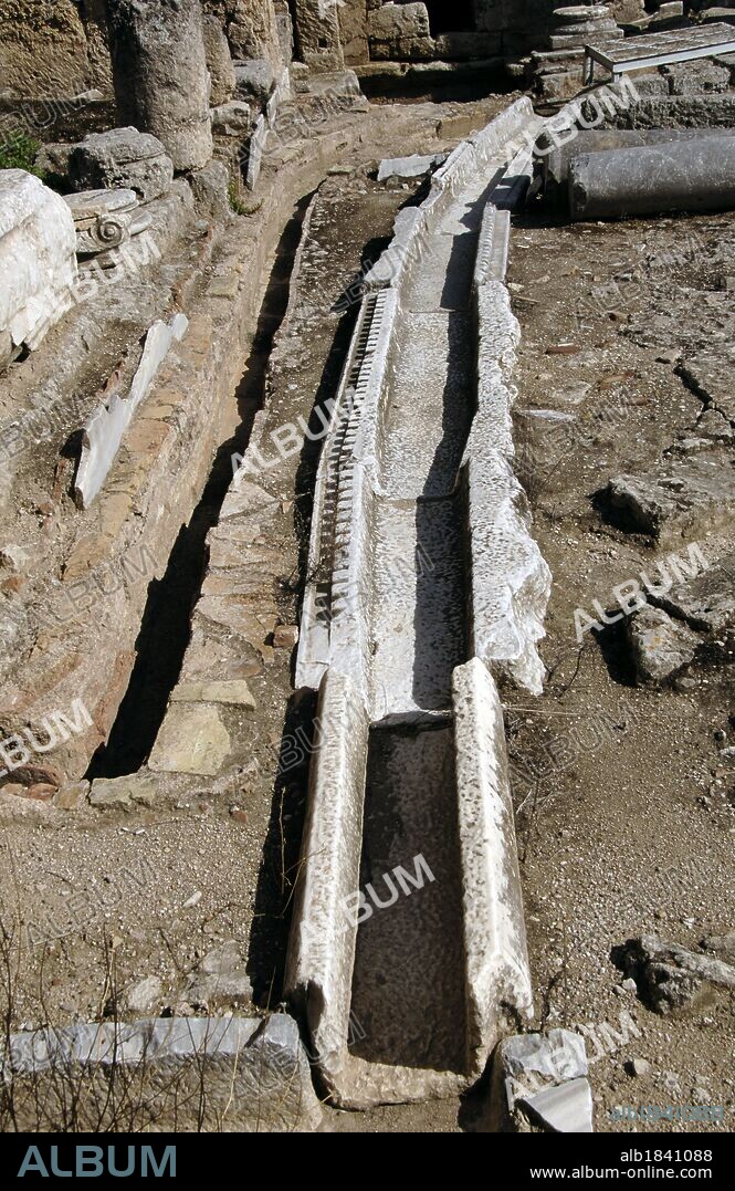 Greece. Ancient Corinth. Fountain of Peirene. Detail of a channel of the Peirene fountain through which water was channeled from the upper fountain. It was used until the Byzantine era. Remains. Peloponnese Region.