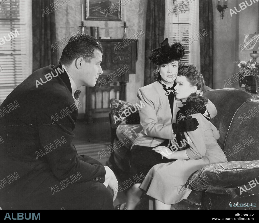 ANN BLYTH, JACK CARSON and JOAN CRAWFORD in MILDRED PIERCE, 1945, directed by MICHAEL CURTIZ. Copyright WARNER BROTHERS.