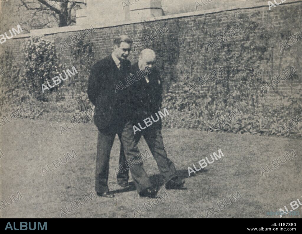 'Mr. Anthony Eden Visits The Prime Minister', 1940s, (1945). Anthony Eden, Secretary of State for War, with British Prime Minister Winston Churchill in the garden at Number Ten Downing Street in London during the Second World War. Churchill (1874-1965) was Prime Minister of the United Kingdom from 1940 to 1945, and again from 1951 to 1955. From "The Life and Times of Winston Churchill", by Malcolm Thomson. [Odhams Press Limited, London].