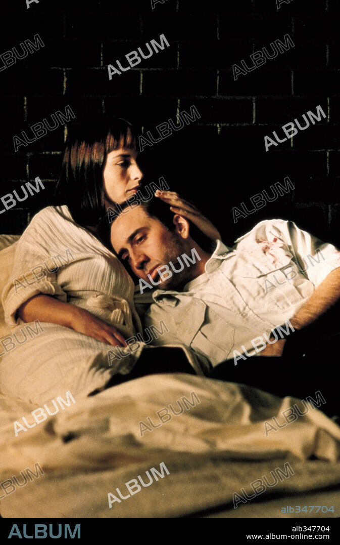 NICOLAS CAGE and PATRICIA ARQUETTE in BRINGING OUT THE DEAD, 1999, directed by MARTIN SCORSESE. Copyright TOUCHSTONE PICTURES / CARUSO, PHILLIP.