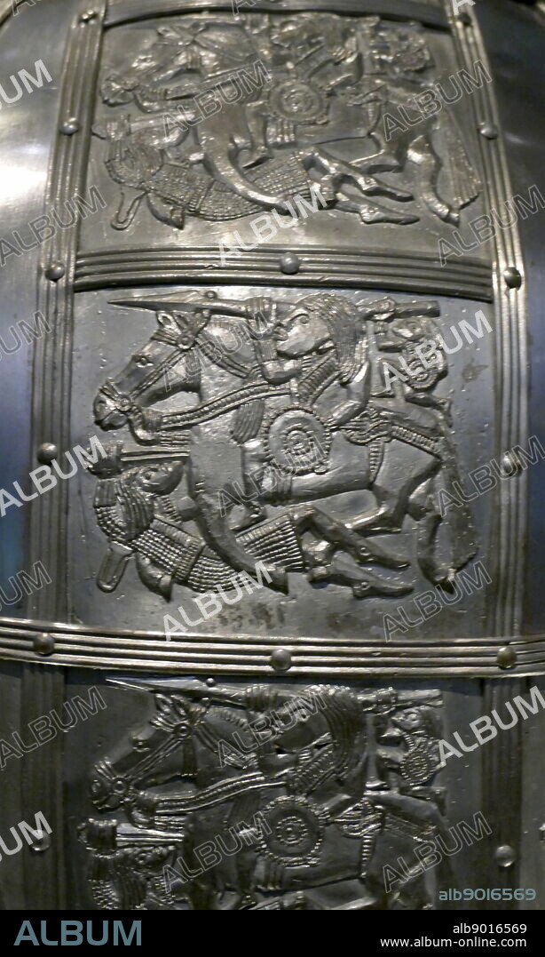 reconstruction of the Sutton Hoo helmet, a decorated Anglo-Saxon helmet discovered during the 1939 excavation of the Sutton Hoo ship-burial. Buried around 625 AD. it is believed to have been the helmet of King Raedwald; for whom its elaborate decoration may have given it a secondary function almost akin to a crown.