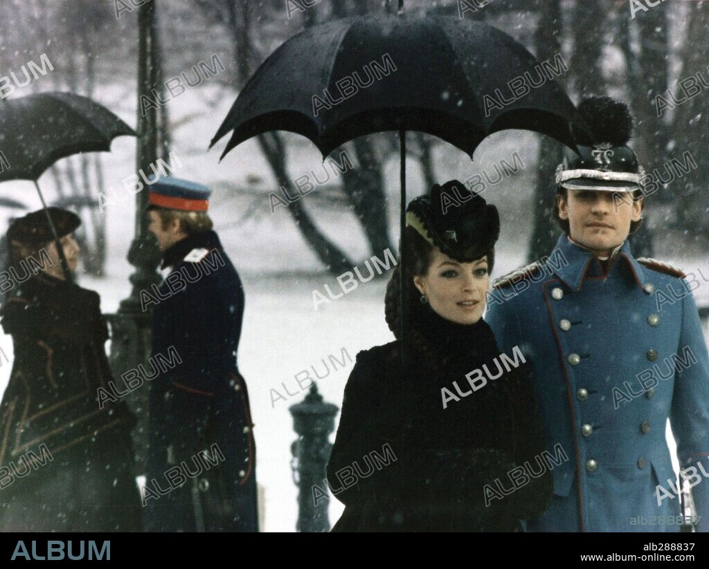 ELISABETH VON BAYERN, HELMUT BERGER, LOUIS II DE BAVIERE and ROMY SCHNEIDER. HELMUT BERGER and ROMY SCHNEIDER in LUDWIG, 1972, directed by LUCHINO VISCONTI. Copyright M.G.M.