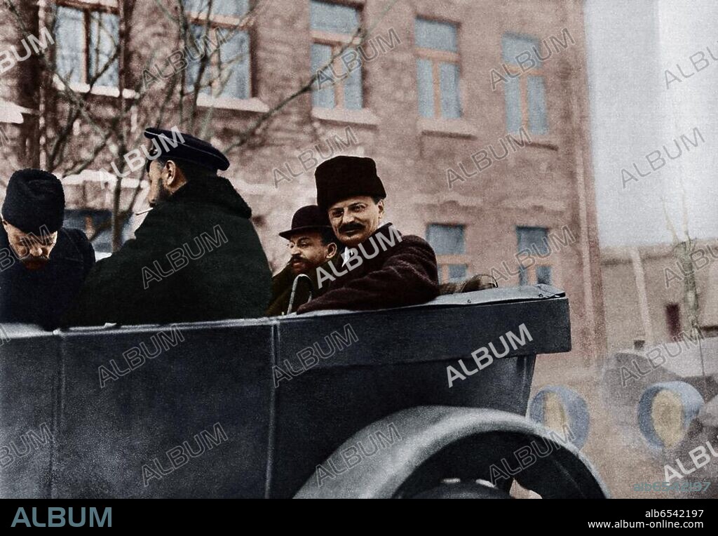 World War I (1914-1918); Russian-German armistice, Treaty of Brest-Litovsk on 15th December 1917, and consequent peace negotiations.-From left to right: Leon Trotzki, Adolph Joffe and Admiral Vasily Altfater (or Vasili Alvater) on their way to negotiations.-German press photo, c. December 1917; digitally coloured.