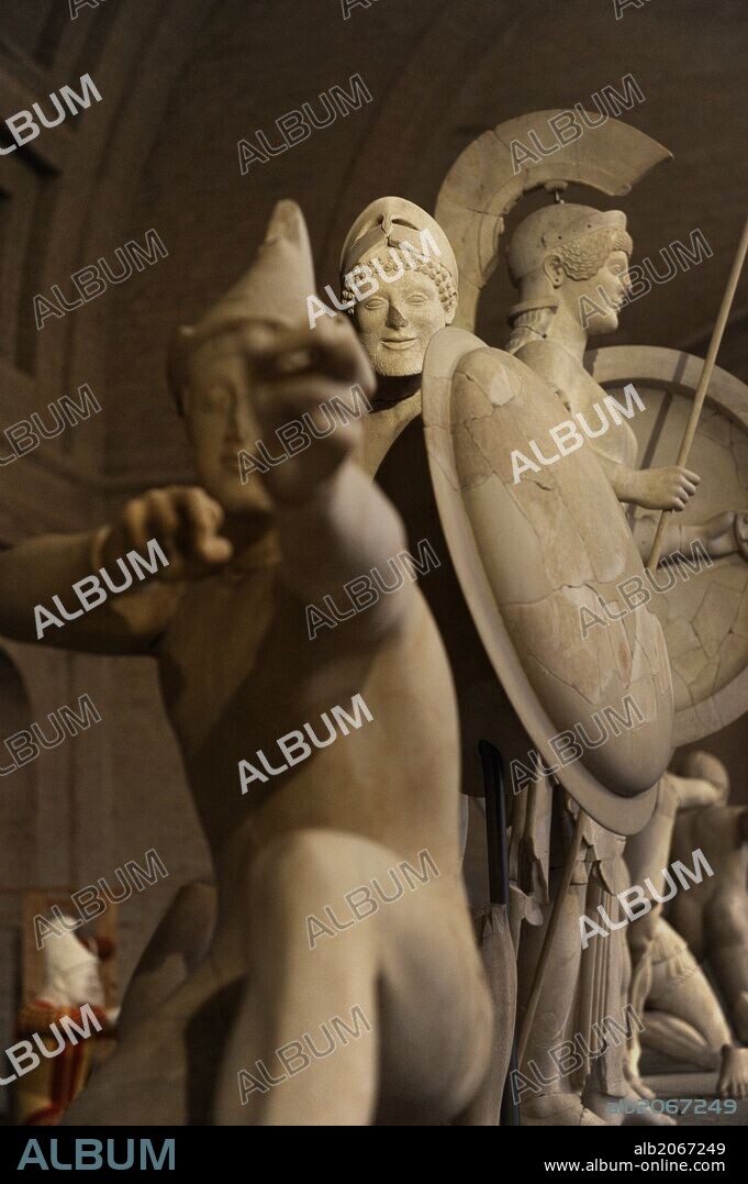 Aegina West Pediment. 500-490 BC. Gods in battle before Troy, in the presence of the goddess Athena. Fighting during the siege of Agamemnon. Detail of Paris as a archer. Late Archaic. Marble. From Sanctuary of Aphaia, Aegina Island, Greece.