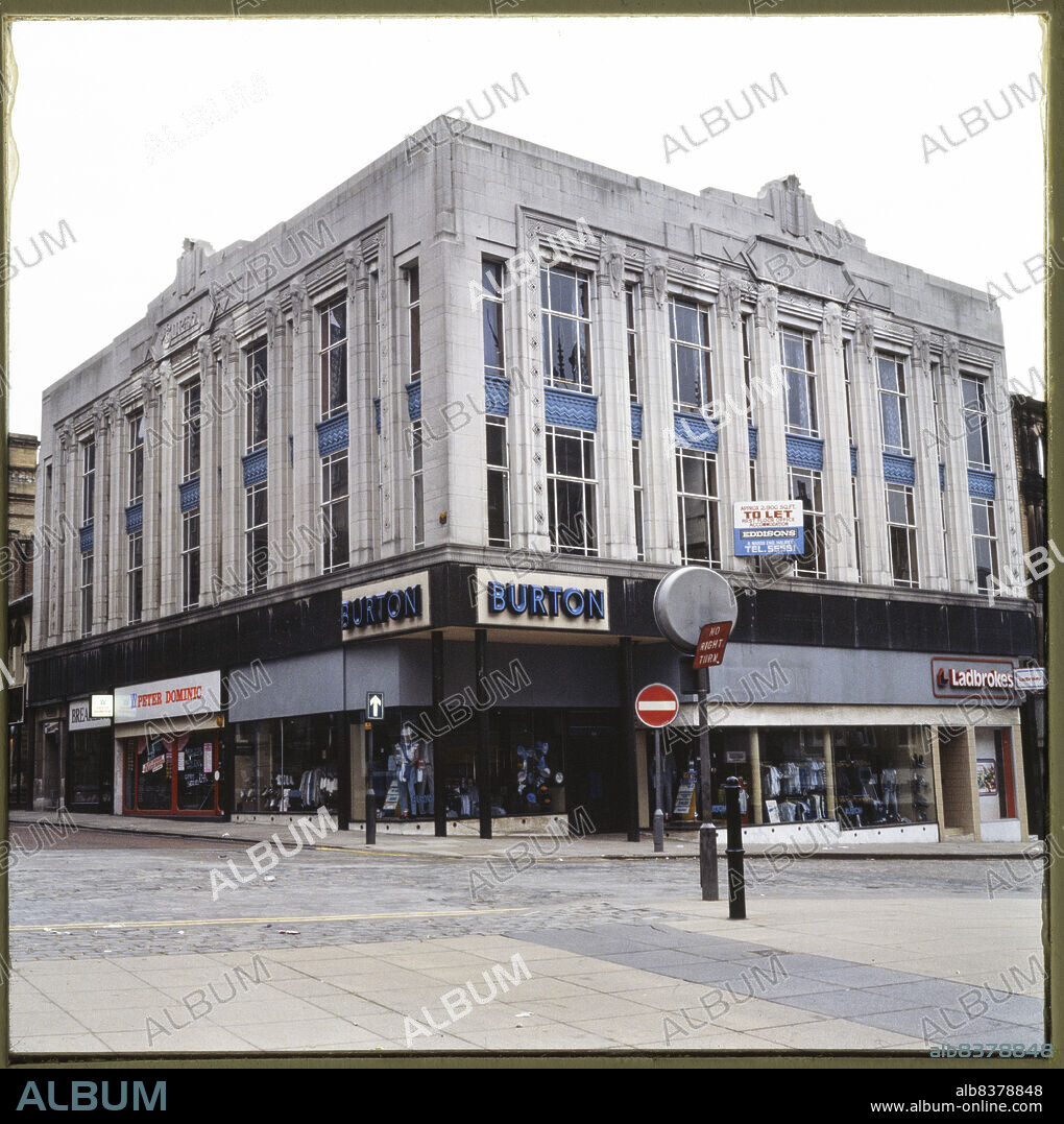 NICHOLAS ANTHONY JOHN PHILPOT. Burton, 22-24 Old Market, Halifax, Calderdale, 1970s-1980s. The Burton store at 22-24 Old Market, seen from the south-west. Foundation stones were laid by Arnold James Burton, Raymond Montague Burton and Stanley Howard Burton in 1932. The Old Market store was later occupied by businesses including McDonald's.
