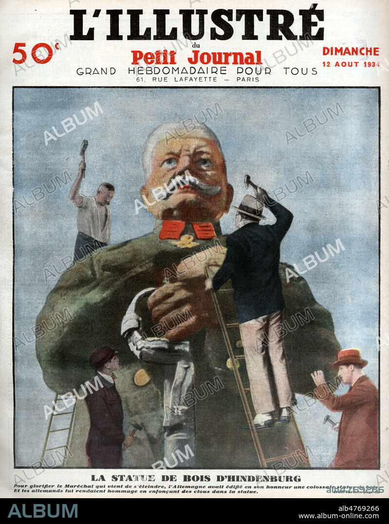 'La statue de bois d'HINDENBURG (1847-1934). Pour glorifier le Marechal qui vient de s'eteindre, l'Allemagne avait edifie en son honneur une colossale statue de bois. Et les allemands lui rendaient hommage en enfoncant des clous dans la statue'. Une du Petit Journal du 12 aout 1934. Illustration anonyme. Credit : Collection KHARBINE-TAPABOR.
