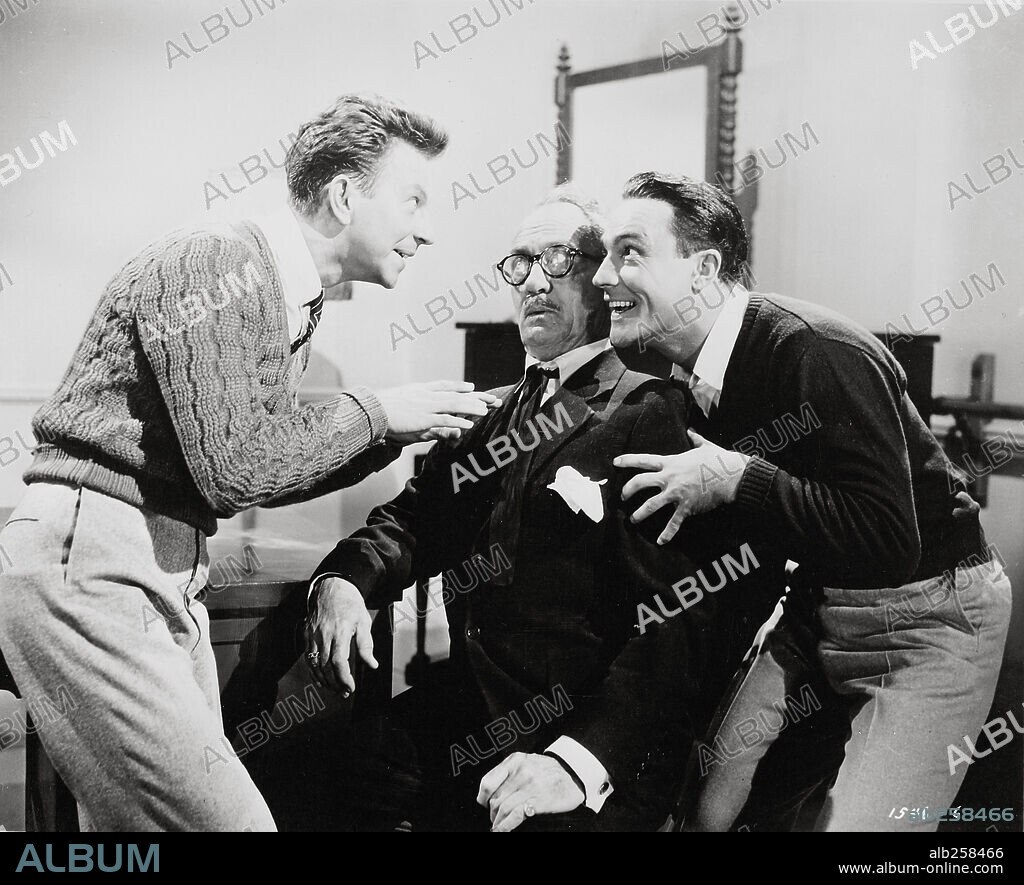 DONALD O'CONNOR and GENE KELLY in SINGIN' IN THE RAIN, 1952, directed by GENE KELLY and STANLEY DONEN. Copyright M.G.M.