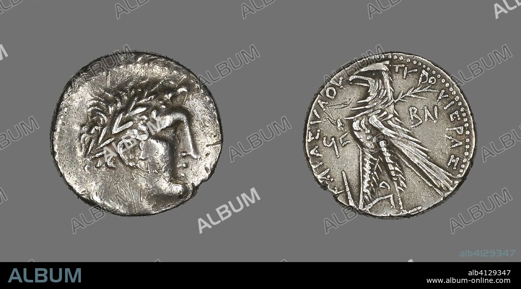 ANCIENT GREEK. Shekel (Coin) Depicting the God Melkarth. Greek, minted in Tyre, Syria. Date: 31 BC-30 BC. Dimensions: Diam. 2.6 cm; 14.17 g. Silver. Origin: Tyre.