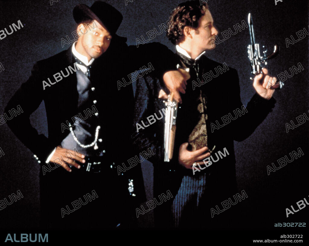 KEVIN KLINE and WILL SMITH in WILD WILD WEST, 1999, directed by BARRY SONNENFELD. Copyright WARNER BROS.