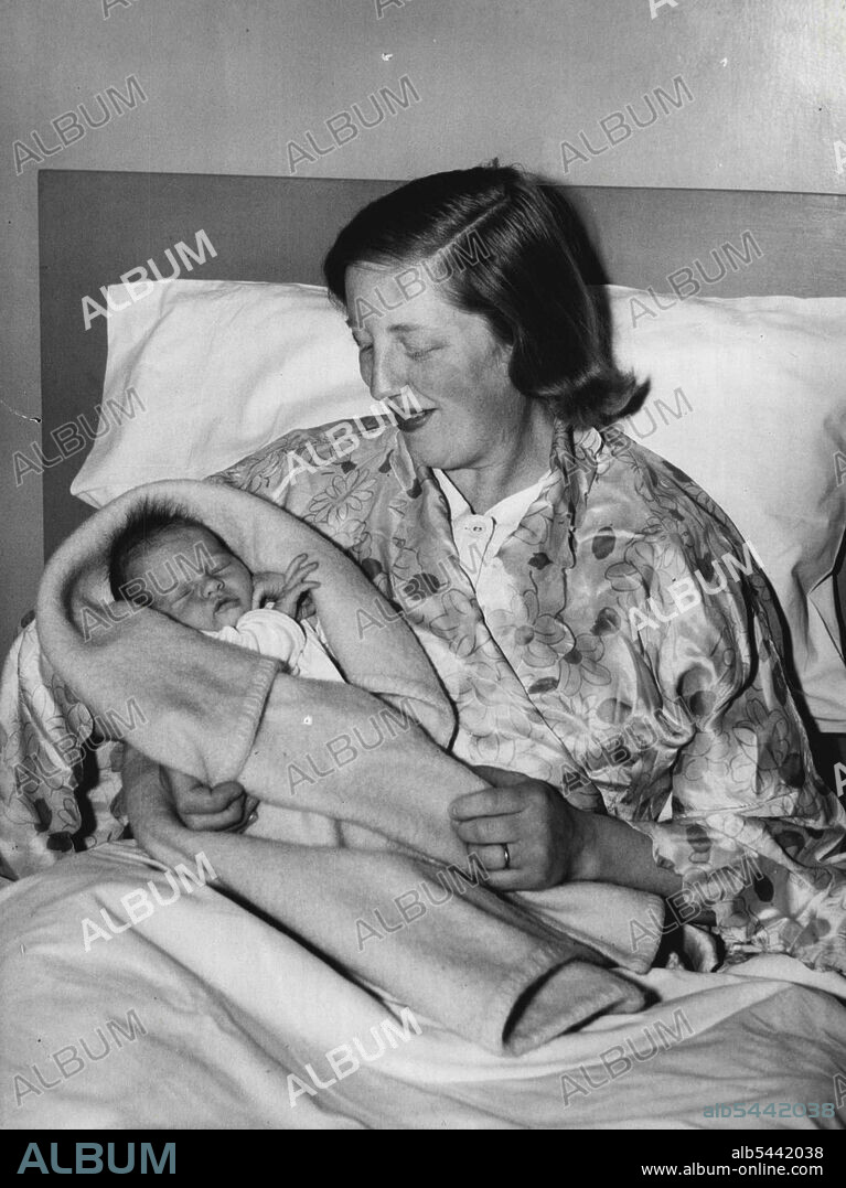 Daughter For Well Known Soprano -- A new and unpublished picture just taken of Mrs. Probyn (Marjorie Shires) with her infant daughter in the nursing home. The birth of a daughter - Linda Judith, was recently announced to Miss Marjorie Shires. One of the principal Sopranos of the sadlers wells opera. She is the wife of Mr. John Probyn, the Australian Baritone, in the company. Miss Shires, who was born in Cheshire, is the daughter of the late Mr. H. Shires and of Mrs. H. Shires of Woodland Avenue, Crewe, Cheshire and her husband Mr. John Probyn is the son of Mr. R. Lee of Sydney, Australia. February 27, 1952. (Photo by Universal).