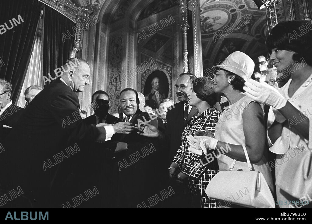 President Johnson and group including Rev. Martin Luther King, Jr., Clarence Mitchell, and Patricia Roberts Harris after the signing of the Voting Rights Act in the Capitol Rotunda, Washington, DC. The Voting Rights Act of 1965 is a landmark piece of federal legislation in the United States that prohibits racial discrimination in voting. It was signed into law by President Lyndon B. Johnson during the height of the American Civil Rights Movement on August 6, 1965, and Congress later amended the Act five times to expand its protections. Designed to enforce the voting rights guaranteed by the Fourteenth and Fifteenth Amendments to the United States Constitution, the Act allowed for a mass enfranchisement of racial minorities throughout the country, especially in the South. According to the U.S. Department of Justice, the Act is considered to be the most effective piece of civil rights legislation ever enacted in the country.