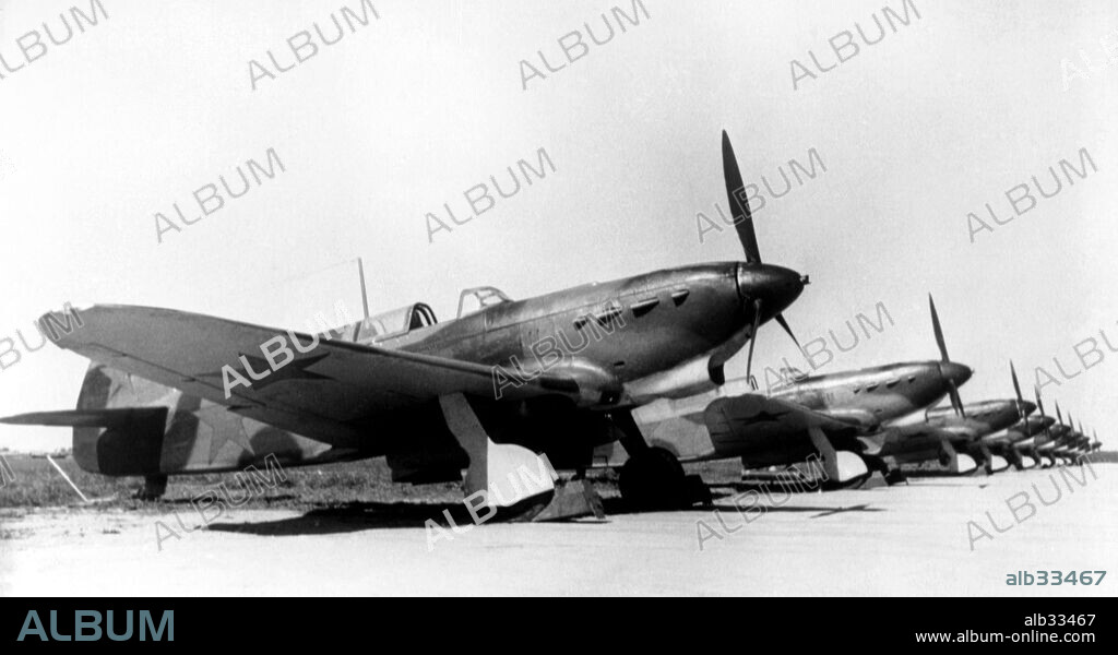 A Yakovlev YAK-1 designed by Alexander Yakovlev. It's got a M-105P cannon, a 12 cylinder Vee engine and a single seat fighter.
