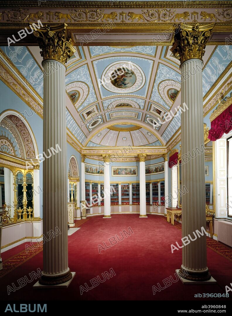 The library at Kenwood House, Hampstead, London, 1990. Richly decorated room with gilt-topped columns and arched alcoves with mirrors. The frieze along the top of the walls contains a lion motif with stylised floral designs. The library at Kenwood House is one of the finest of Robert Adam's rooms in existence and was intended not merely as a library, but as 'a room for receiving company'. The painted panels in the classical allegorical style on the ceiling are by Antonio Zucchi.