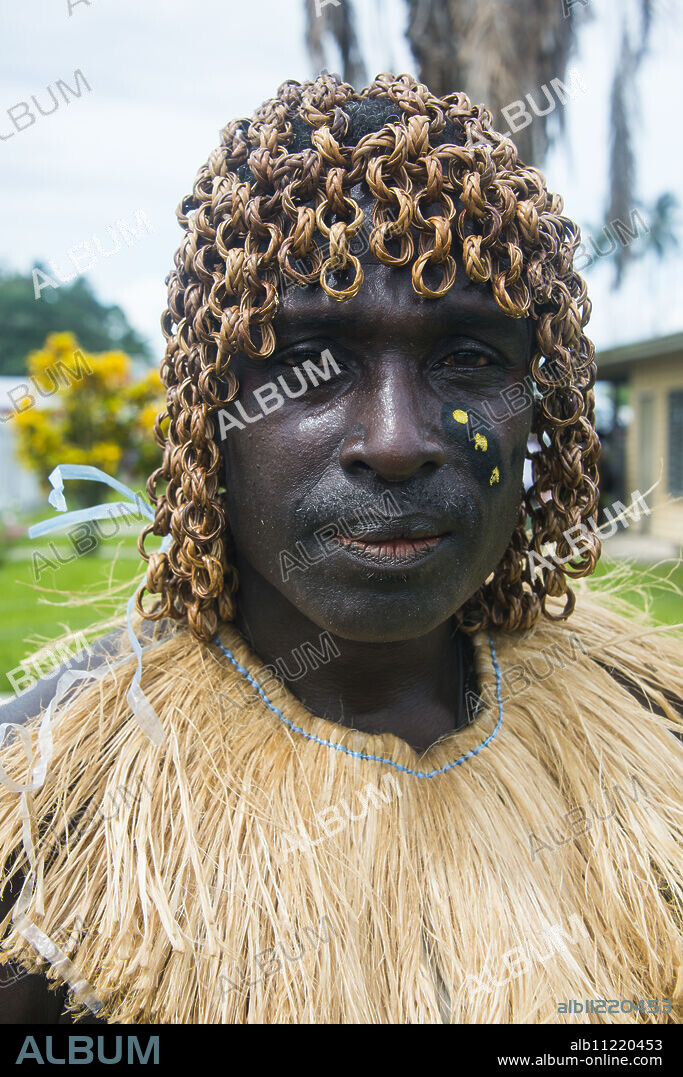 Traditionally dressed man from a Bamboo band in Buka, Bougainville, Papua New Guinea, Pacific.