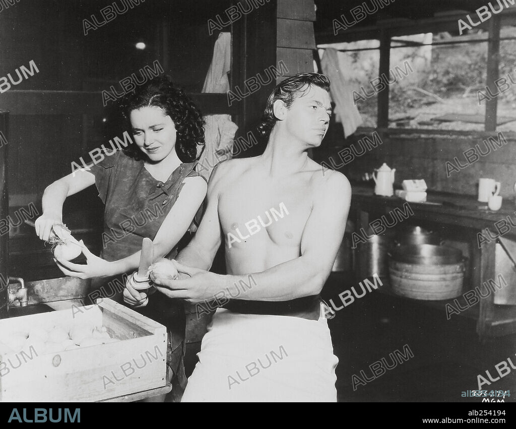 JOHNNY WEISSMULLER y MAUREEN O'SULLIVAN en LA FUGA DE TARZÁN, 1936 (TARZAN ESCAPES), dirigida por RICHARD THORPE. Copyright M.G.M.