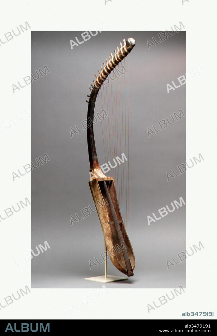 Arched Harp shoulder harp New Kingdom Dynasty 18 late ca. 1390 1295 B.C. From Egypt Wood L. diagonally 82 cm 32 5 16 in l. of sound box 36 cm 14 3 16 in E Album alb3479191