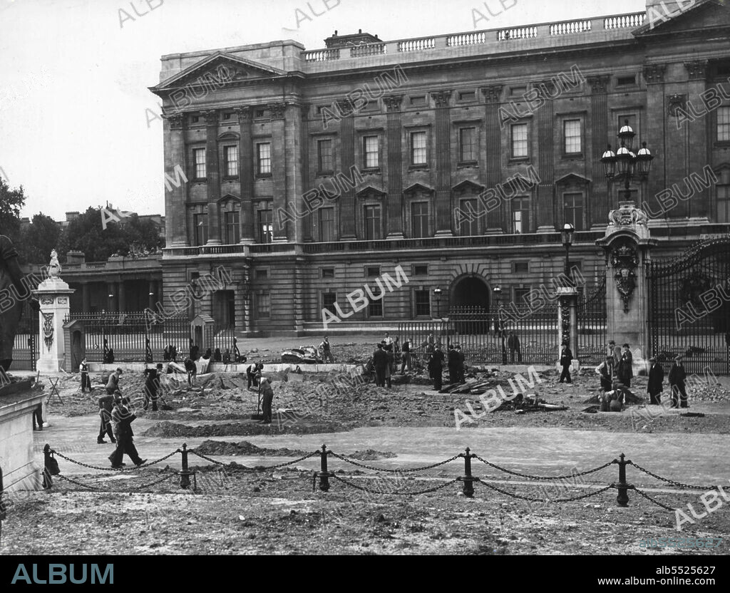 Buckingham Palace Bombed -- Bomb craters and wreckage in the forecourt of Buckingham Palace. November 27, 1940. (Photo by London News Agency Photos).