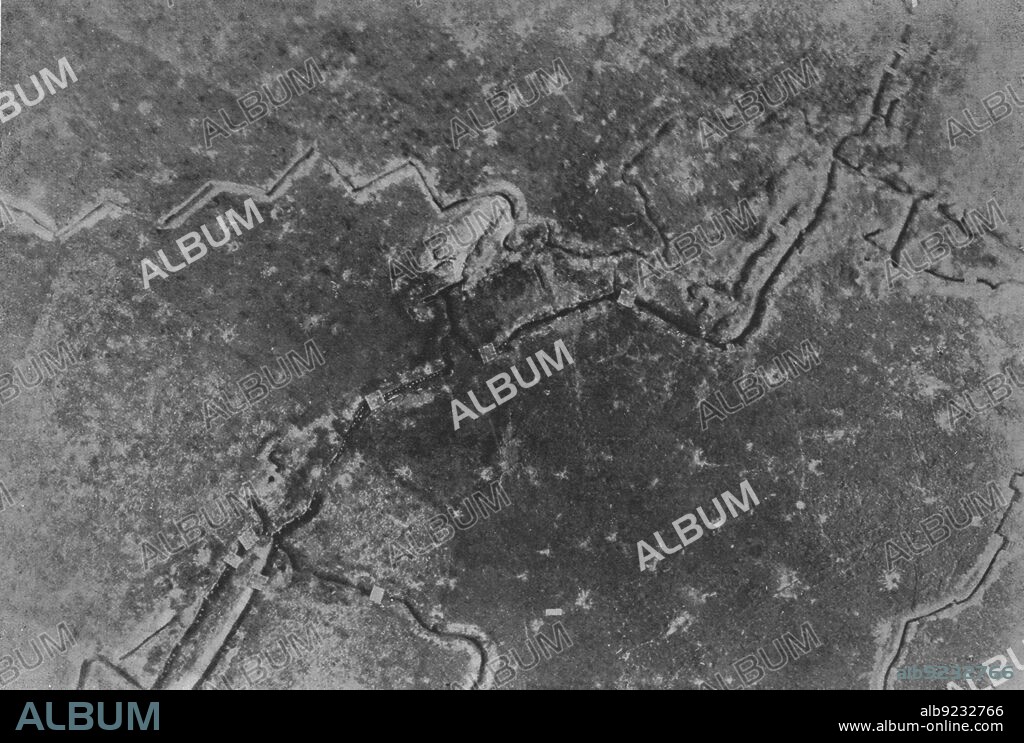 'L'offensive de la Somme; la preparation d'une bataille: L'attaque du 1er juillet 1916 observee d'un aeroplane; Tranchee allemande a un kilometre au Sud-Ouest de Fay, franchie par nos troupes. On voit nettement la progression des hommes groupes ou isoles, qu'eclaire le soleil ; leur ombre se projette derriere eux, vers l'Ouest', 1916. From "Collection de la Guerre IV. L'Illustration Tome CXLVIII. La Guerre Juillet, Aout, Septembre, Octobre, Novembre, Decembre 1916".