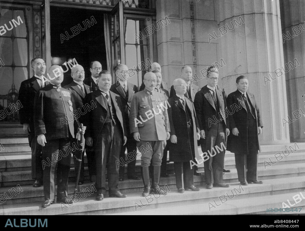 Diet Session Opens ... Members of the Cabinet, headed by Premier General Hideki Tojo, were taken on the steps of the Diet building following the opening of the Diet session today; Photos shows: f.l.t.r. on the front row; Navy Minister Admiral Shigetaro Shimade; Finance Minister Okinobu Kaya, Premier General Hideki Tojo; Education M. Dr. Kunihiko Hashide; President of Planning Board, Lt.-General Teiichi Suzuki; and Agriculture and Forestry Minister, Firoya Ino; (on 2nd row; f.l.t.r.) Director of the Legislation Board, Eiichi Morlyeme; Welfare Minister, Lt.-General Chikahiko Koizumi; Chief-Secretary of the Cabinet, Naoki Hoshino; Foreign Minister, Shigenori Togo; Communication and Railways Minister, Vice-Admiral, Retired, Ken Terashima; Justice Minister Dr. Michiy Iwamura; Commerce and Industry Minister, Nobusuke Kishi; and between Terashima and Iwamura, Presidnet of the Informaton Board, Masayuki Tani. November 16, 1941. (Photo by The Domei News Photos Service).