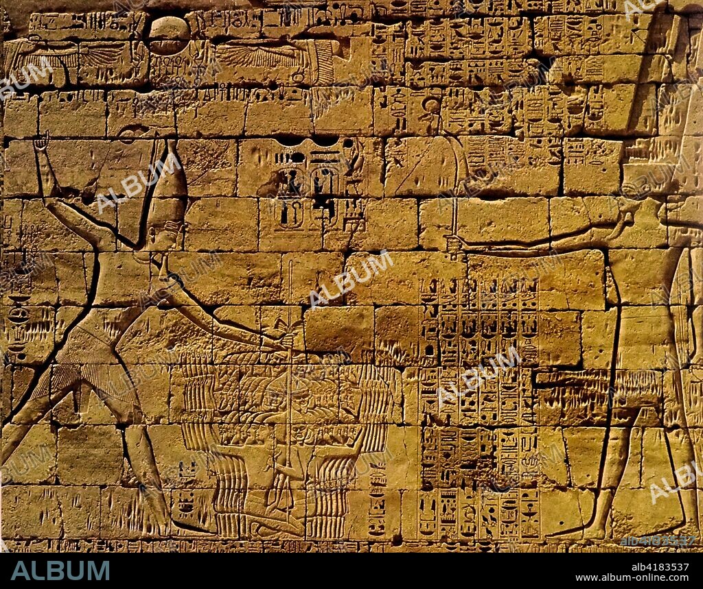 Medinet Habu. Mortuary temple of Ramses III. Relief depicting the king with captured Asiatic warriors before the god Amon-Re. Twentieth Dynasty. Usimare Ramses III (also written Ramses and Rameses) was the second Pharaoh of the Twentieth Dynasty and is considered to be the last monarch of the New Kingdom to wield any substantial authority over Egypt 1186–1155 BC.