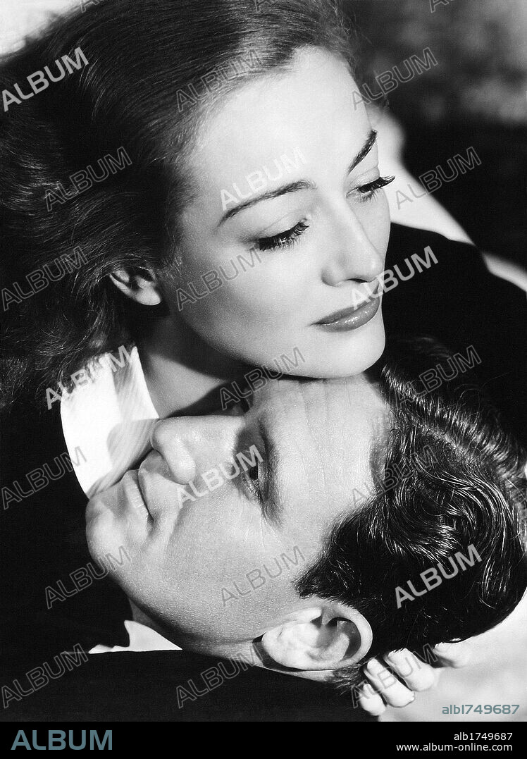 JOAN CRAWFORD and SPENCER TRACY in MANNEQUIN, 1937, directed by FRANK BORZAGE. Copyright M.G.M.
