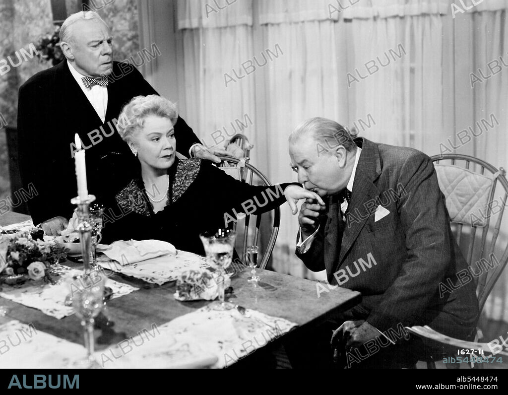 "Louisa" - A Universal-International Picture. Romantically inclined Charles Coburn interrupts Edmund Gwenn and Spring Byington in this highlight comedy scene from Universal-International's "Louisa" co-starring Ruth Hussey and Ronald Reagan. January 1, 1950. (Photo by Universal International Picture).
