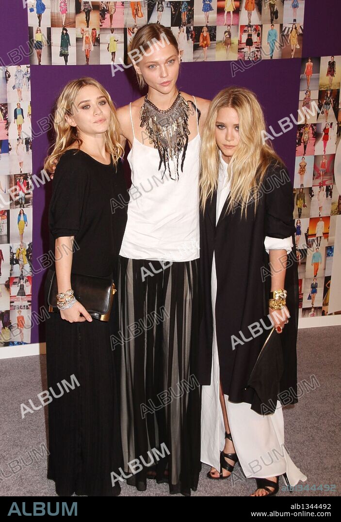 ASHLEY OLSEN, MARY KATE OLSEN and SASHA PIVOVAROVA. Jun. 07, 2010 - New York, New York, U.S. - (L-R) ASHLEY OLSEN, SASHA PIVOVAROVA, and MARY-KATE OLSEN attend the 2010 CFDA Fashion Awards held at the Alice Tully Hall at Lincoln Center. 07/06/2010