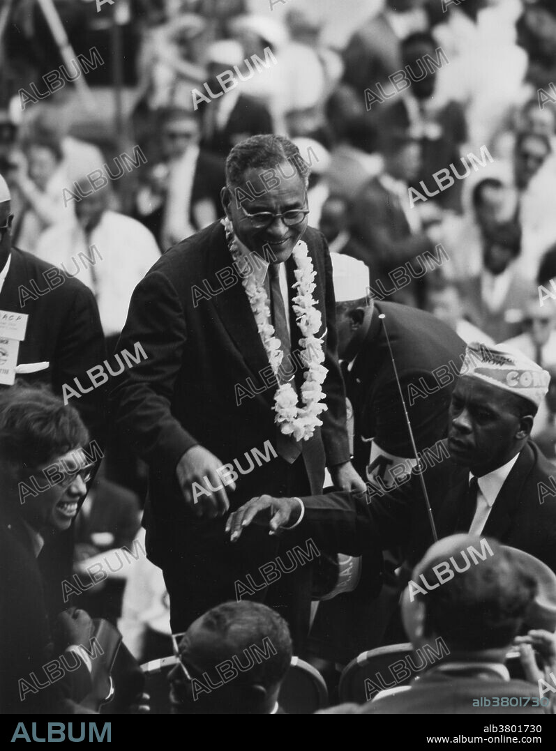Entitled: "Dr. Ralph Bunche." The March on Washington for Jobs and Freedom was one of the largest political rallies for human rights in United States history and called for civil and economic rights for African-Americans. On Wednesday, August 28, 1963. Martin Luther King, Jr., standing in front of the Lincoln Memorial, delivered his historic "I Have a Dream" speech in which he called for an end to racism. The march was organized by a group of civil rights, labor, and religious organizations, under the theme "jobs, and freedom". Estimates of the number of participants varied from 200,000 to 300,000; it is widely accepted that approximately 250,000 people participated in the march. Observers estimated that 75-80% of the marchers were black. The march is credited with helping to pass the Civil Rights Act (1964) and preceded the Selma Voting Rights Movement which led to the passage of the Voting Rights Act (1965). Ralph Johnson Bunche (August 7, 1903 or 1904 - December 9, 1971) was an African-American political scientist, academic, and diplomat.