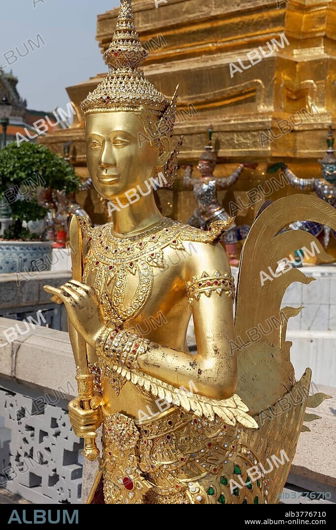 Gold plated statue Theppaksi, mythical Buddhist figure, half woman, half bird, Wat Phra Kaeo, Ko Ratanakosin, Bangkok, Thailand, Asia.