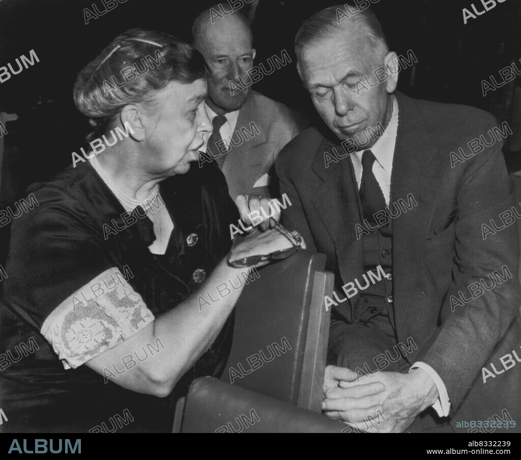 Informal Conference - Mrs. Eleanor Roosevelt speaks as Secretary of State George C. Marshall (right) and Francis B. Sayre (center) alternate representative on the U.S. United Nations delegation, listen during informal huddle today at the United Nations Assembly. September 17, 1947. (Photo by AP Wirephoto).