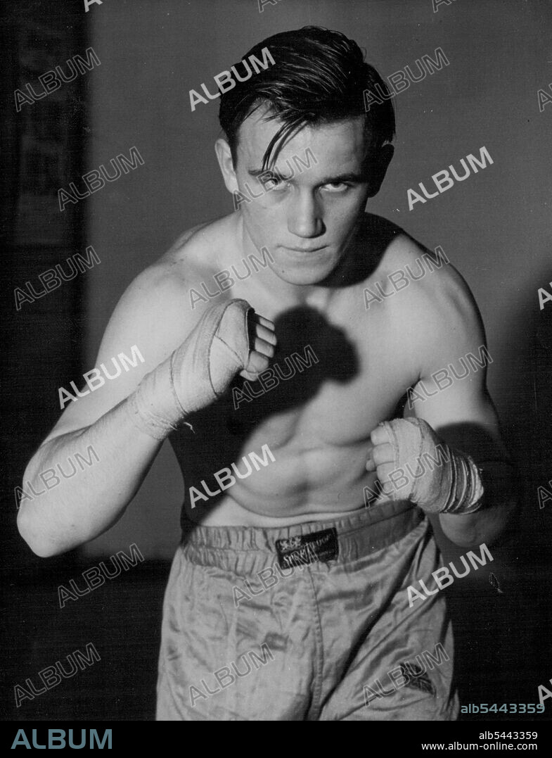 At 16 He's A Knock-Out -- A new picture of Danny Sewell, the sixteen-year-old heavyweight school boy boxer. Danny has already taken part in two professional contests and on each occasion he knocked out his opponent in the first round. January 27, 1947. (Photo by Reuterphoto).
