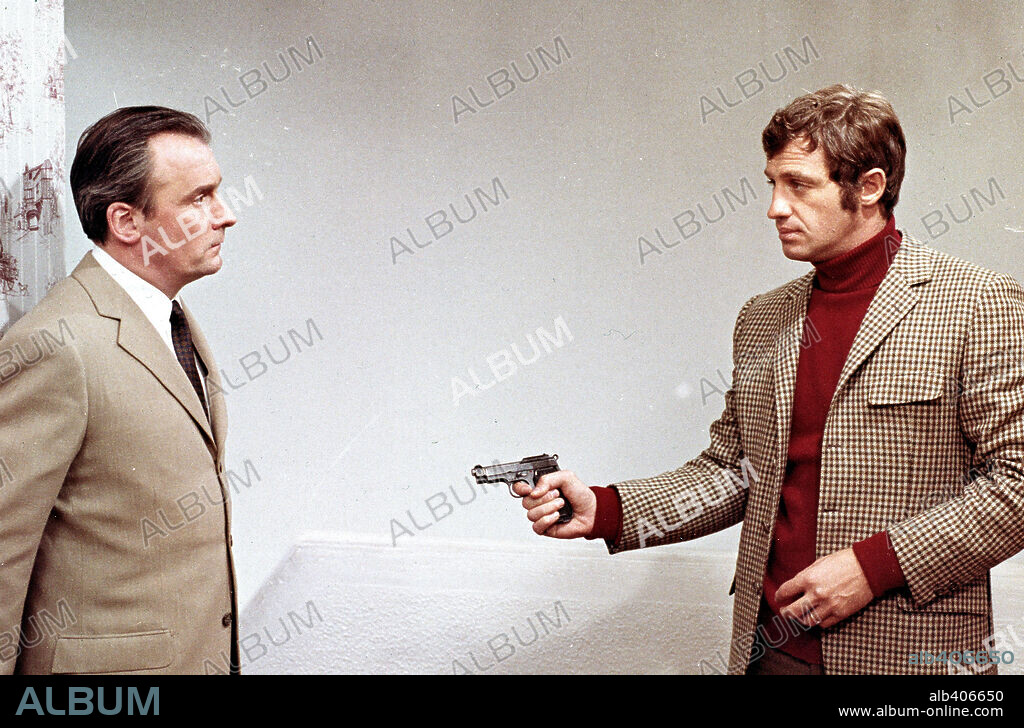 JEAN-PAUL BELMONDO and MICHEL BOUQUET in MISSISSIPPI MERMAID, 1969 (LA SIRENE DU MISSISSIPPI), directed by FRANCOIS TRUFFAUT. Copyright FILMS DU CAROSSE/ARTISTES ASSOCIES.
