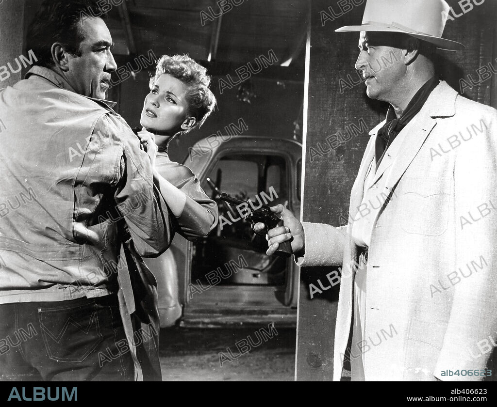ANTHONY QUINN, DEBRA PAGET and RAY MILLAND in THE RIVER'S EDGE, 1957, directed by ALLAN DWAN. Copyright 20TH CENTURY FOX.