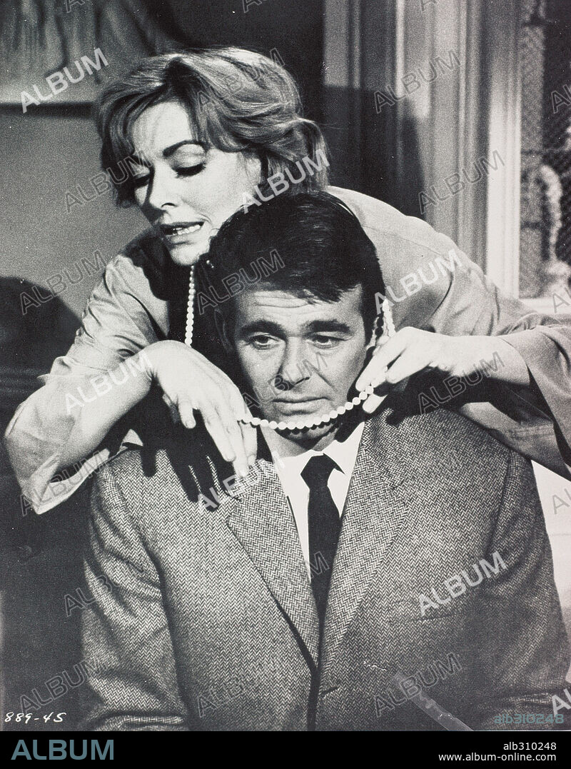 Eleanor Jane Parker and STUART WHITMAN. ELEANOR PARKER and STUART WHITMAN in AN AMERICAN DREAM, 1966, directed by ROBERT GIST. Copyright WARNER BROTHERS.