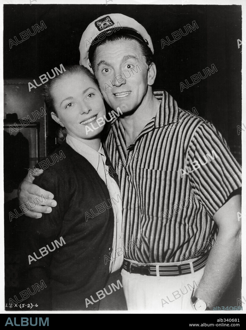 KIRK DOUGLAS and Eleanor Jane Parker. ELEANOR PARKER and KIRK DOUGLAS in LIZZIE, 1957, directed by HUGO HAAS. Copyright M.G.M.