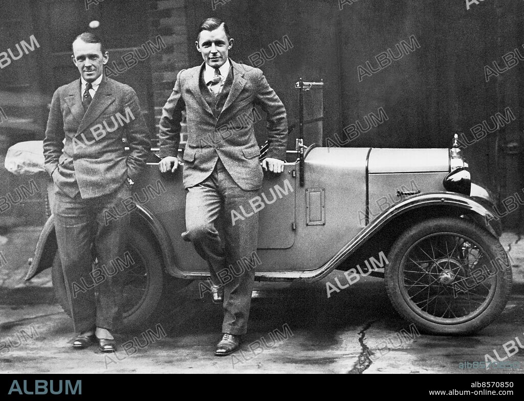 Orig. bildtext... ROUND THE WORLD IN A BABY CAR. Two New Zealanders, Messrs Hector MacQuarrie and Richard B. Matthews, who are girdling the earth in a baby car, have arrived in London. They have already done ten thousand miles and anticipate to complete the rest of their thirty thousand mile trip within six months. They started off from New Zealand, their original car being sunk when the Tahiti went down in the South Seas last August. Photo shows: Mr. Hector MacQuarrie, and Richard B. Matthews (right) with their car in which they are girdling the world, photographed in London. Anm. Resenärer CD350 sites: LONDON;STORBRITANNIEN;NYA ZEELAND*.