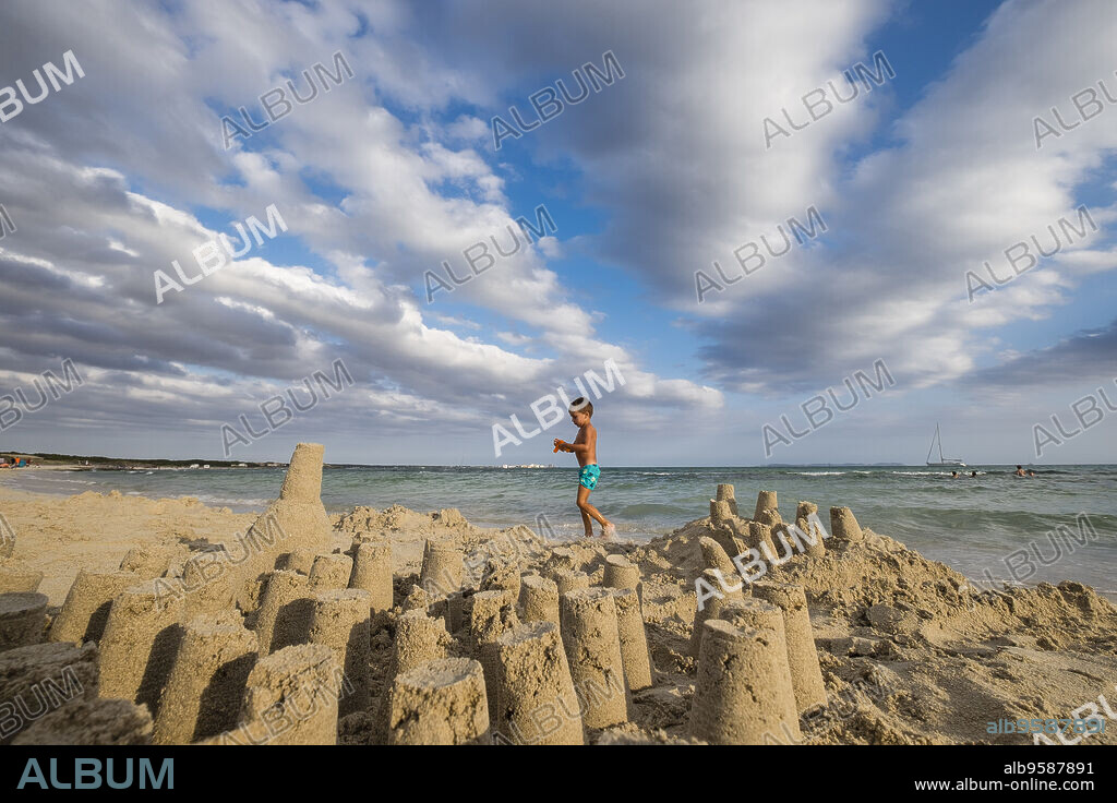 playing with sand, Sa Rapita beach, protected natural area, Campos, Mallorca, Balearic Islands, Spain, Europe.