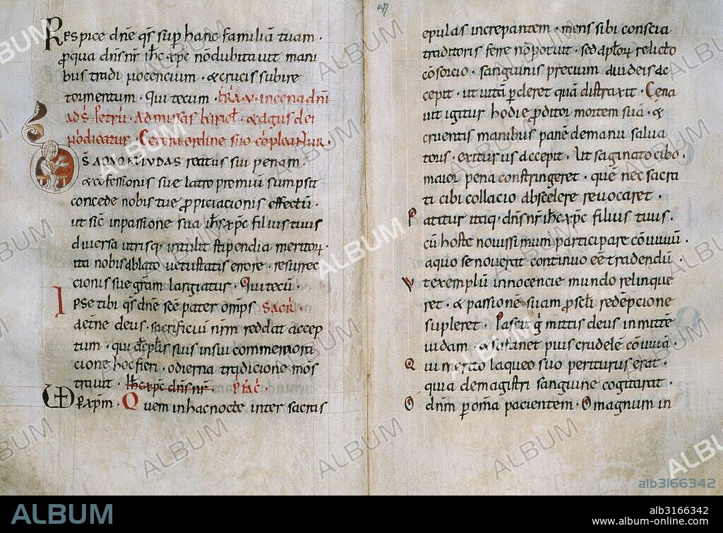 SACRAMENTARIO DEL MONASTERIO DE RIPOLL. Manuscrito en pergamino. Tamaño: 290 x 225 mm. 221 folios. Fechado hacia el 1050. Escrito en letra carolina de gran formato y rúbricas de color rojo. Folio 36. JUEVES SANTO CON LETRA INICIAL "D" decorada con el rostro de Cristo bendiciendo. Sacramentario gregoriano del tipo Adriano mixto. Museu Episcopal de Vic. Provincia de Barcelona. Comarca de Osona. Cataluña.