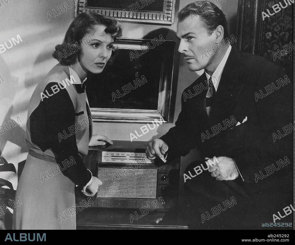 ANNA LEE and BRIAN DONLEVY in HANGMEN ALSO DIE, 1943, directed by FRITZ LANG. Copyright UNITED ARTISTS.