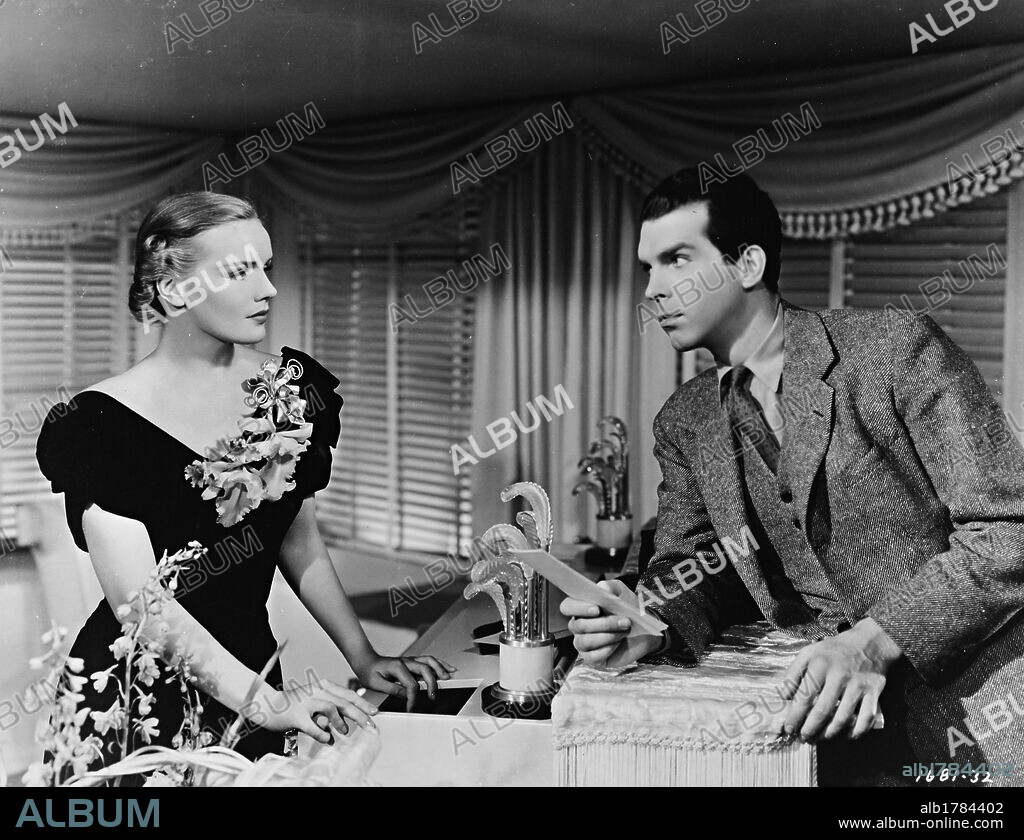 FRANCES FARMER and FRED MACMURRAY in EXCLUSIVE, 1937, directed by ALEXANDER HALL. Copyright PARAMOUNT PICTURES.