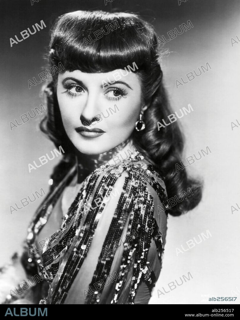 BARBARA STANWYCK en BOLA DE FUEGO, 1941 (BALL OF FIRE), dirigida por HOWARD HAWKS. Copyright RKO/SAMUEL GOLDWYN.