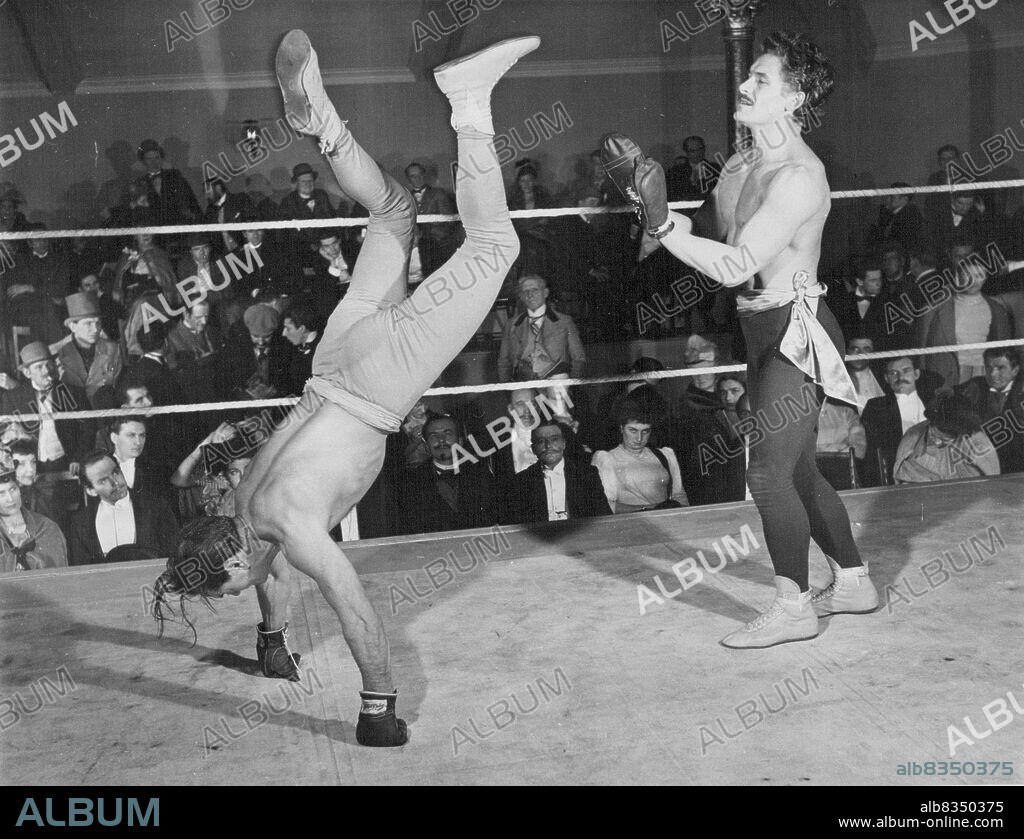 Dave Crowley (left) ex-lightweight champion and Jackie Cooper, play the French pugilists in a preliminary La Savate bout.The film "Laughing Anne," now being made by London Film Studios, Shepperton, which is being produced and directed by Herbert Wilcox, will take picturegoers back to the sporting days in Paris and the year 1882, in which the now banned La Savate and bare fist fight are featured. Forrest Tucker and Margaret Lockwood, star in the film. January 6, 1953. (Photo by Daily Mirror).