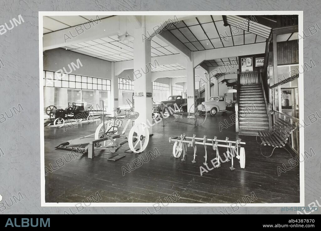 Photograph - International Harvester, Showroom Interior, Adelaide, 06 May 1946, One of four black and white photographs attached to an album page. The page is one of 28 that previously made up a photograph album containing black & white photographs of the International Harvester Company's state branch offices and showrooms throughout Australia. Part of a large collection of glass plate and film negatives, transparencies, photo albums, product catalogues, videos,.