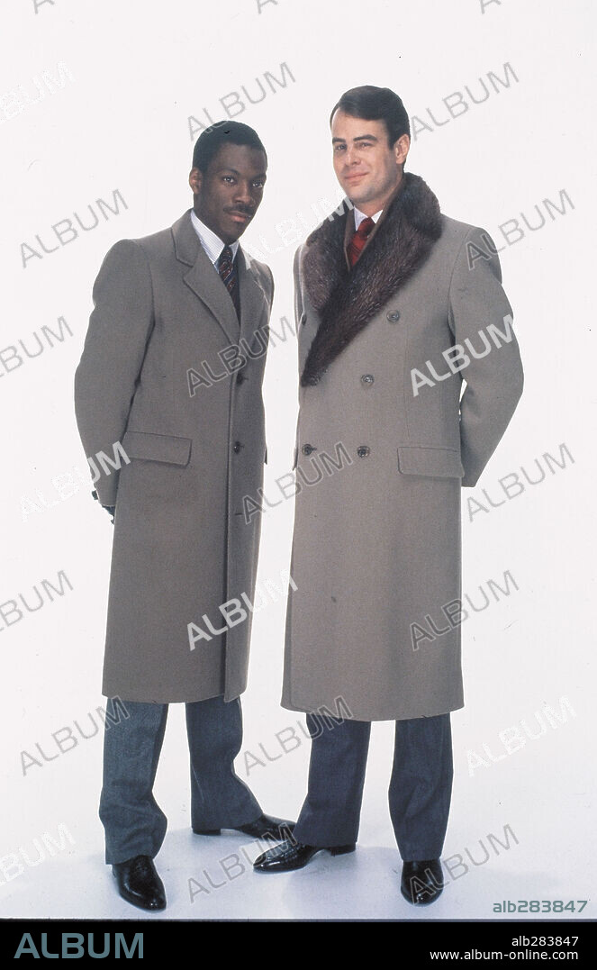 DAN AYKROYD y EDDIE MURPHY en ENTRE PILLOS ANDA EL JUEGO, 1983 (TRADING PLACES), dirigida por JOHN LANDIS. Copyright PARAMOUNT PICTURES.