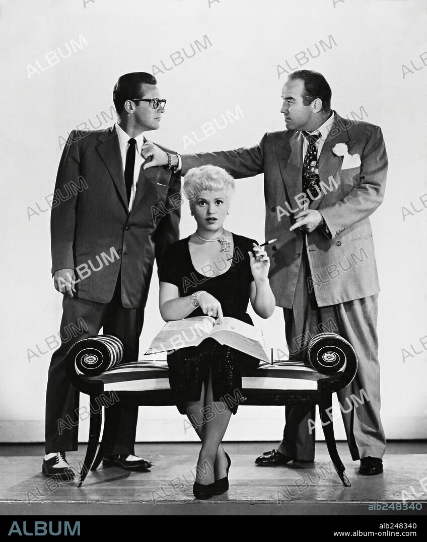 BRODERICK CRAWFORD, JUDY HOLLIDAY and WILLIAM HOLDEN in BORN YESTERDAY, 1950, directed by GEORGE CUKOR. Copyright COLUMBIA PICTURES.